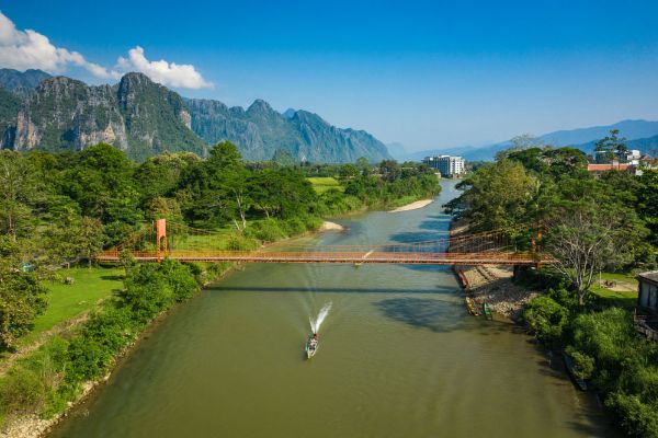 Day 2: Vientiane - Vang Vieng - visit Cave and Kayaking