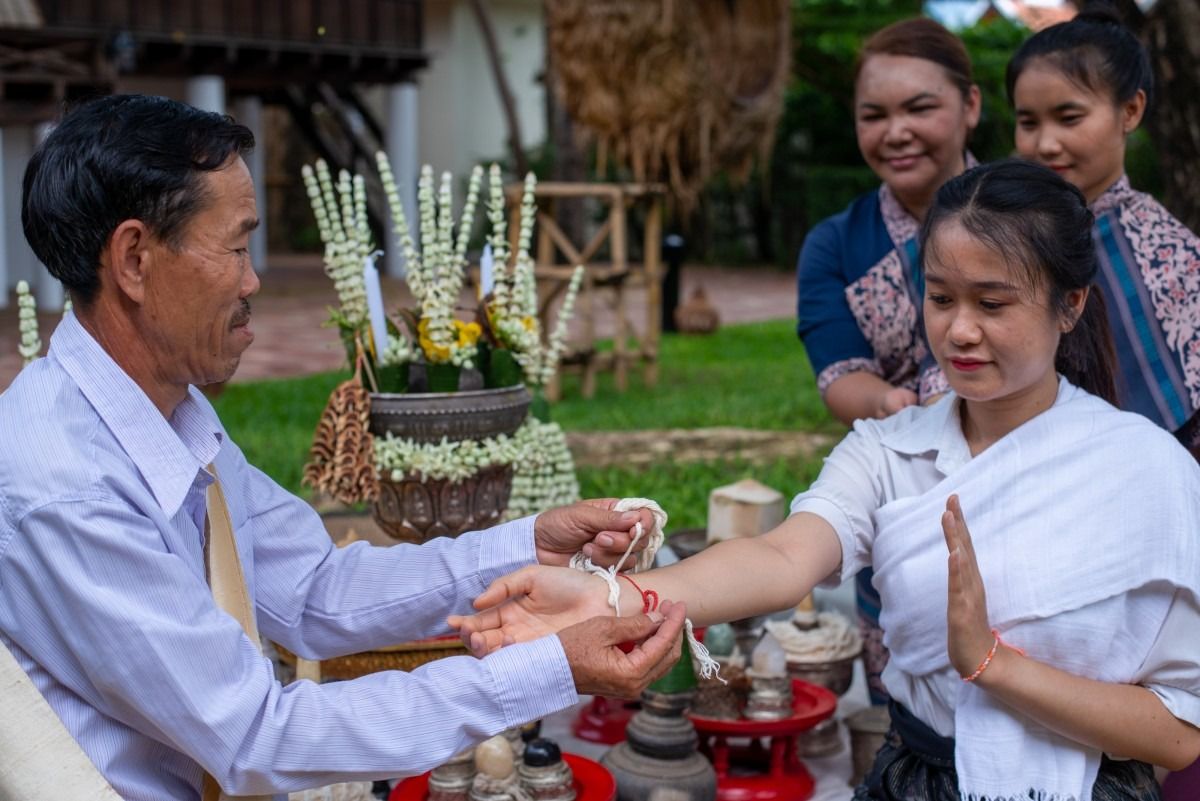 baci ceremony in laos - laos travel